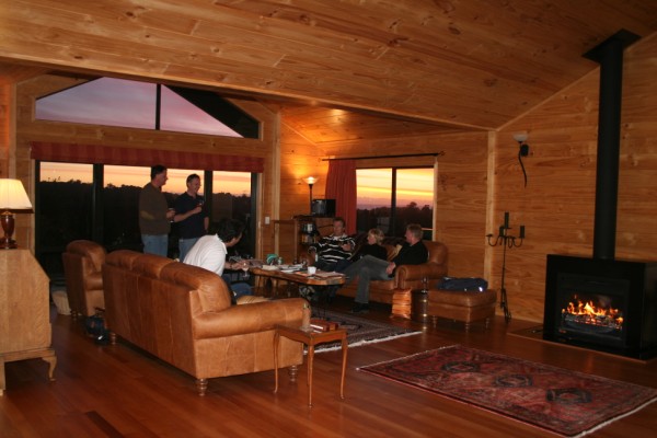 Guests enjoying the Lounge andopen fire at Birds Ferry Lodge